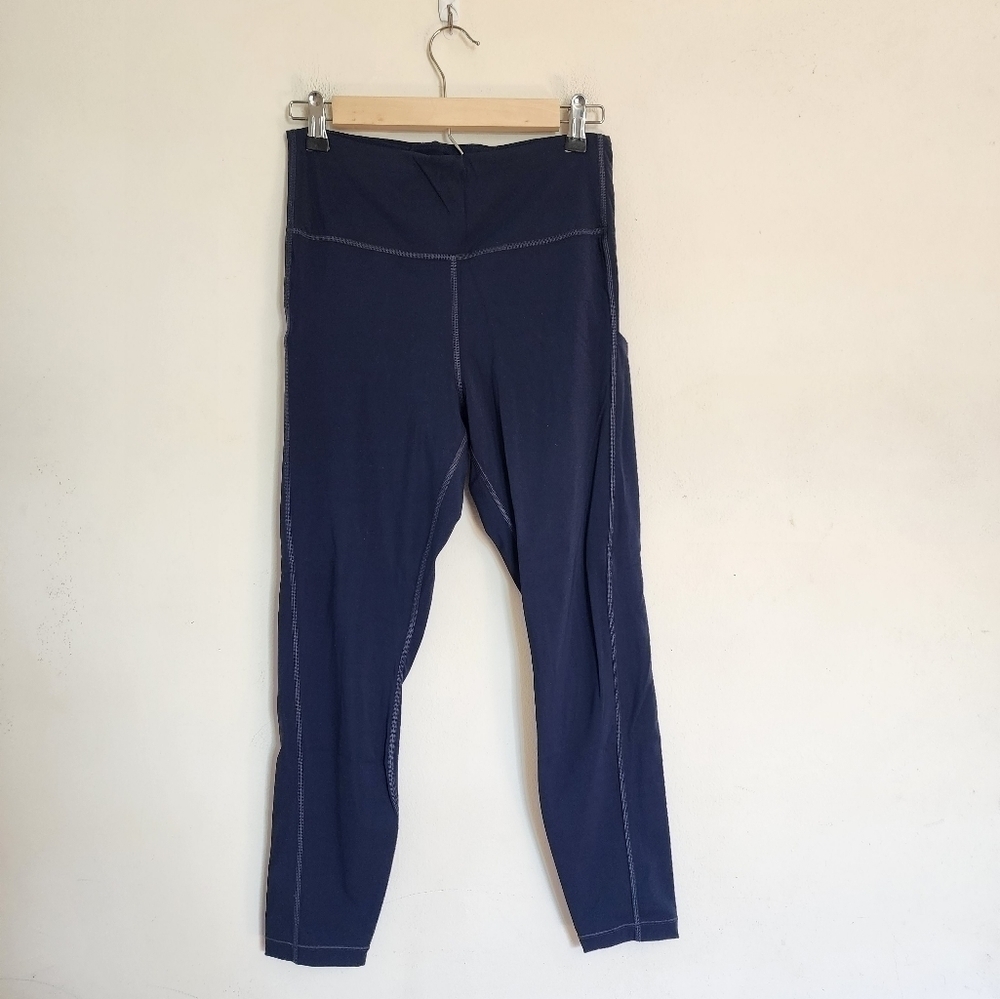 Athleta Ultimate Stash Pocket 7/8 Tights in Navy Blue size Medium